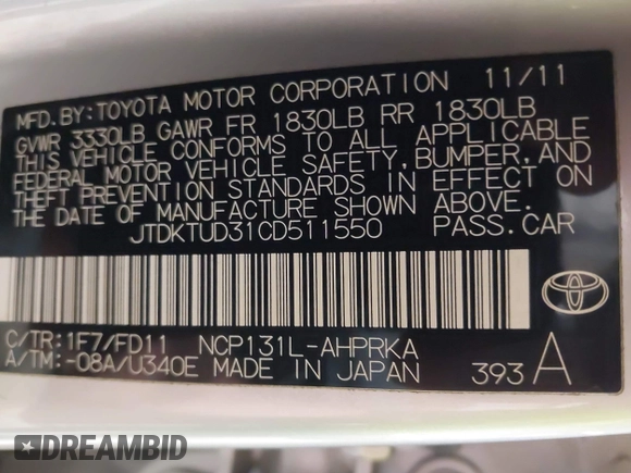 2012 Toyota Yaris L with VIN JTDKTUD31CD511550, listed as a IAAI auction lot 42157934 with 131,183 mi miles. Bid and sale history available at carsss.com. Image 9.