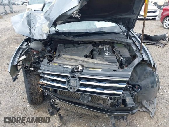 2021 Volkswagen Tiguan SE z VIN 3VV3B7AX8MM159316, wystawiony jako IAAI lot #42525546 z przebiegiem 70 141 mil mil oraz . Historia ofert i sprzedaży dostępna na DreamBid. Obrazek 10.