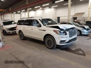 2021 Lincoln Navigator Black Label z VIN 5LMJJ3TT3MEL15532, wystawiony jako IAAI lot #41330001 z przebiegiem 62 325 mil mil oraz . Historia ofert i sprzedaży dostępna na DreamBid. Obrazek 1.