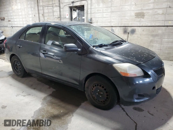 2009 Toyota Yaris z VIN JTDBT903391318992, wystawiony jako Copart lot #58753615 z przebiegiem 286 924 mil mil oraz Tytuł czysty. Historia ofert i sprzedaży dostępna na DreamBid. Obrazek 4.