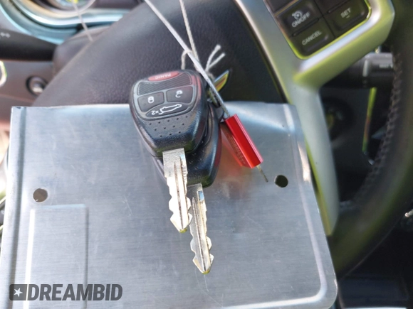 2014 Chrysler 200 Touring with VIN 1C3CCBBB7EN128927, listed as a IAAI auction lot 42313892 with 154,261 mi miles and . Bid and sale history available at DreamBid. Image 11.