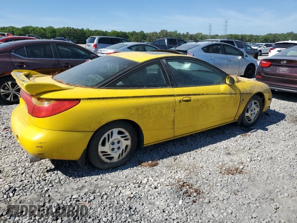 2001 Saturn SC z VIN 1G8ZR12781Z311096, wystawiony jako Copart lot #60574014 z przebiegiem Nie podano mil oraz Tytuł czysty. Historia ofert i sprzedaży dostępna na DreamBid. Obrazek 3.