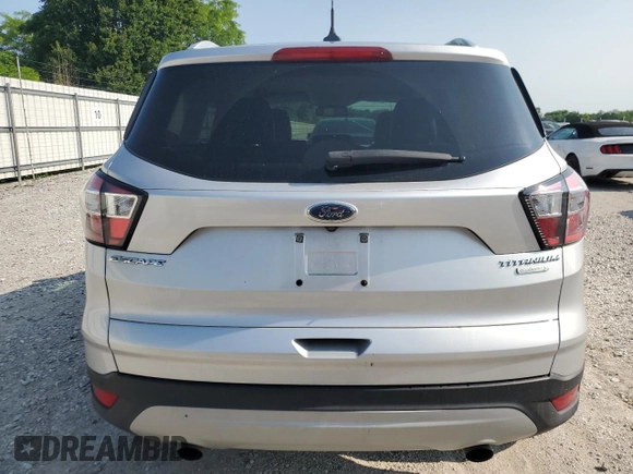 2018 Ford Escape Titanium z VIN 1FMCU0J95JUD44086, wystawiony jako Copart lot #58978865 z przebiegiem 90 874 mil mil oraz Szkoda całkowita • Salvage title. Historia ofert i sprzedaży dostępna na DreamBid. Obrazek 6.