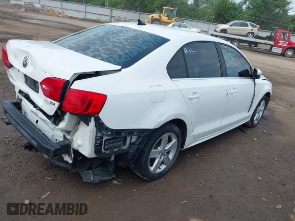 2013 Volkswagen Jetta TDI w/Premium/Nav with VIN 3VWLL7AJ3DM418377, listed as a IAAI auction lot 42768223 with 149,241 mi miles and . Bid and sale history available at DreamBid. Image 4.