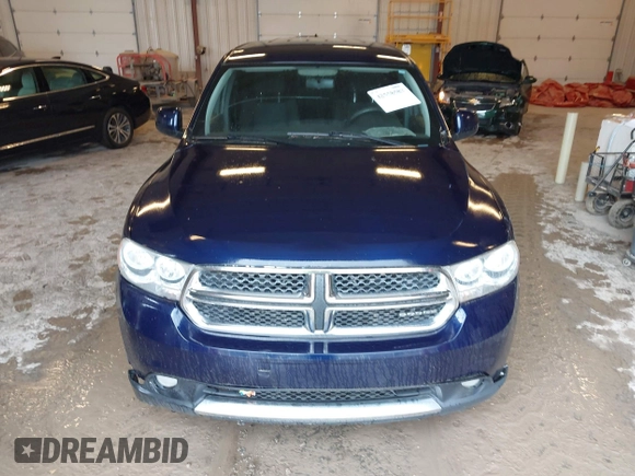 2012 Dodge Durango SXT with VIN 1C4RDJAG9CC169871, listed as a IAAI auction lot 42558583 with 259,113 mi miles and . Bid and sale history available at DreamBid. Image 12.
