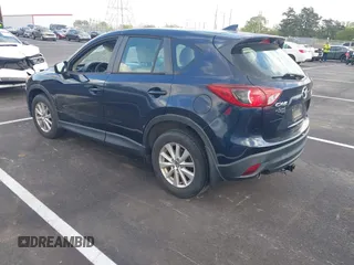 2016 Mazda CX-5 Sport with VIN JM3KE2BY3G0740488, listed as a IAAI auction lot 42000449 with 43,009 mi miles. Bid and sale history available at carsss.com. Image 3.