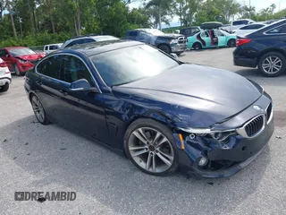 2017 BMW 4 Series 430i z VIN WBA4F7C57HG787156, wystawiony jako IAAI lot #42708781 z przebiegiem 73 220 mil mil oraz . Historia ofert i sprzedaży dostępna na DreamBid. Obrazek 1.