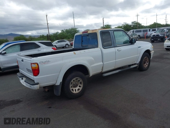 2002 Mazda B-Series Truck DS z VIN 4F4YR16U32TM12981, wystawiony jako IAAI lot #42421997 z przebiegiem 130 610 mil mil oraz . Historia ofert i sprzedaży dostępna na DreamBid. Obrazek 4.