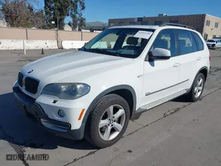 2007 BMW X5 3.0si with VIN 5UXFE43567LY82907, listed as a IAAI auction lot 41499356 with 117,173 mi miles. Bid and sale history available at carsss.com. Image 2.