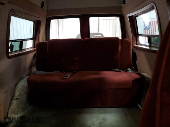 1992 GMC Safari z VIN 1GDEL19W2NB539396, wystawiony jako Copart lot #79221434 z przebiegiem 99 406 mil mil oraz Nie do naprawy • Non repairable. Historia ofert i sprzedaży dostępna na DreamBid. Obrazek 10.