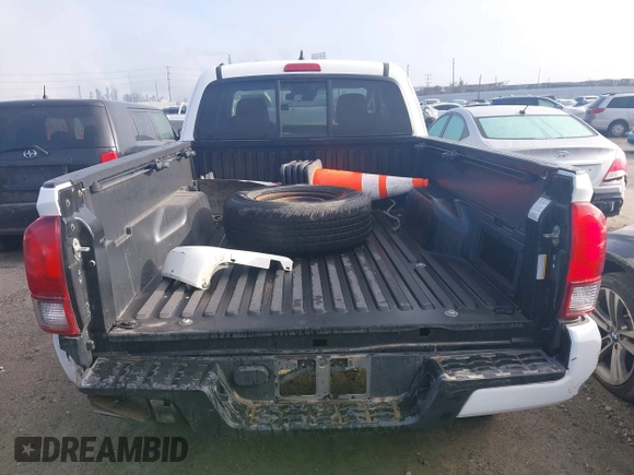 2019 Toyota Tacoma SR with VIN 5TFSX5EN0KX066774, listed as a IAAI auction lot 41534797 with 153,172 mi miles and . Bid and sale history available at DreamBid. Image 16.