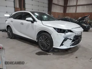2025 Lexus RX 450h+ Luxury with VIN JTJCJMGA6S2025585, listed as a IAAI auction lot 42389588 with 844 mi miles and . Bid and sale history available at DreamBid. Image 1.
