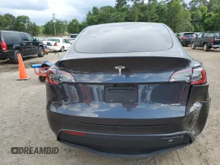 2024 Tesla Model Y Long Range z VIN 7SAYGAEE7RF123224, wystawiony jako Copart lot #58410545 z przebiegiem Nie podano mil oraz Szkoda całkowita • Salvage title. Historia ofert i sprzedaży dostępna na DreamBid. Obrazek 6.