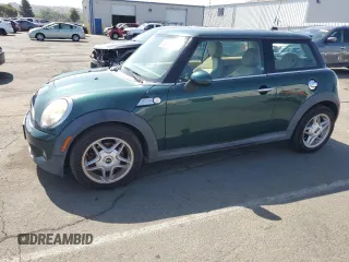 2009 MINI Hardtop S with VIN WMWMF73539TW85698, listed as a Copart auction lot 54957685 with 98,429 mi miles and Clean Title. Bid and sale history available at DreamBid. Image 1.