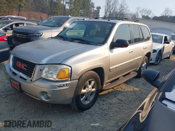 2005 GMC Envoy SLT with VIN 1GKDT13S752251920, listed as a IAAI auction lot 41670725 with 192,509 mi miles. Bid and sale history available at carsss.com. Image 2.