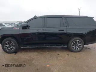 2022 Chevrolet Suburban Z71 with VIN 1GNSKDKD3NR251387, listed as a IAAI auction lot 41566234 with 154,014 mi miles. Bid and sale history available at carsss.com. Image 14.
