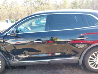 2016 Lincoln MKX Select with VIN 2LMTJ6KR9GBL59252, listed as a IAAI auction lot 41608092 with 144,128 mi miles. Bid and sale history available at carsss.com. Image 14.
