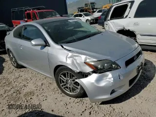 2009 Scion tC z VIN JTKDE167590296040, wystawiony jako Copart lot #58440895 z przebiegiem 171 825 mil mil oraz Szkoda całkowita • Salvage title. Historia ofert i sprzedaży dostępna na DreamBid. Obrazek 13.
