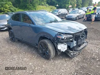 2023 Mazda CX-30 S Preferred with VIN 3MVDMBCM4PM558181, listed as a IAAI auction lot 42589333 with 12,384 mi miles and . Bid and sale history available at DreamBid. Image 1.