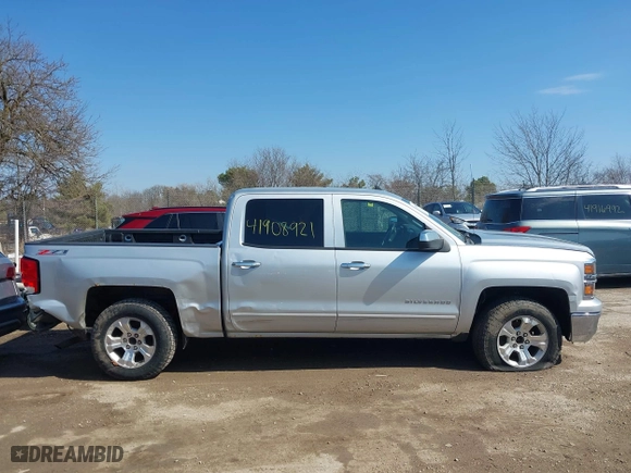 2015 Chevrolet Silverado 1500 LT with VIN 3GCUKREC0FG316716, listed as a IAAI auction lot 41908921 with 242,093 mi miles. Bid and sale history available at carsss.com. Image 13.