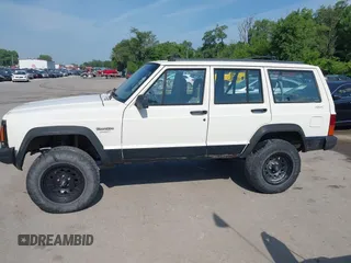 1996 Jeep Cherokee Sport z VIN 1J4FJ68S3TL226188, wystawiony jako IAAI lot #42460538 z przebiegiem 217 118 mil mil oraz . Historia ofert i sprzedaży dostępna na DreamBid. Obrazek 14.