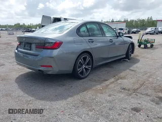 2023 BMW 3 Series 330i with VIN 3MW69FF00P8D61512, listed as a IAAI auction lot 41992509 with 15,809 mi miles and . Bid and sale history available at DreamBid. Image 4.