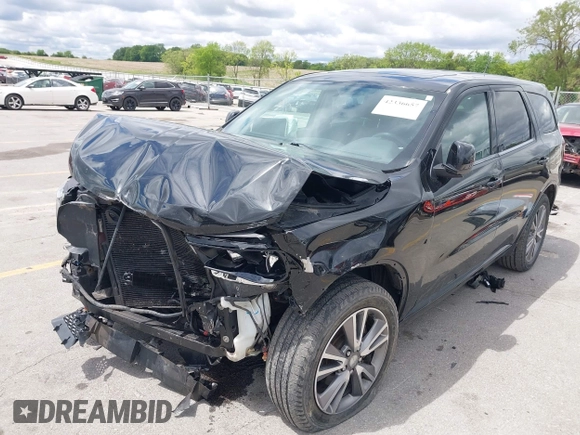 2013 Dodge Durango SXT with VIN 1C4RDJAG4DC697450, listed as a IAAI auction lot 42336657 with 177,476 mi miles and . Bid and sale history available at DreamBid. Image 17.