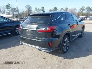 2018 Lexus RX 350L Premium z VIN JTJDZKCA8J2005182, wystawiony jako IAAI lot #41740685 z przebiegiem 113 405 mil mil oraz . Historia ofert i sprzedaży dostępna na DreamBid. Obrazek 4.