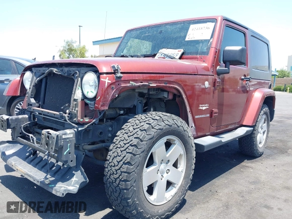 2010 Jeep Wrangler Sahara z VIN 1J4AA5D14AL125062, wystawiony jako IAAI lot #42418736 z przebiegiem 90 839 mil mil oraz . Historia ofert i sprzedaży dostępna na DreamBid. Obrazek 2.