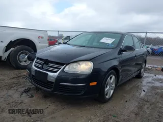 2009 Volkswagen Jetta Sedan SE with VIN 3VWRM71K39M061922, listed as a IAAI auction lot 41833902 with 207,905 mi miles. Bid and sale history available at carsss.com. Image 2.