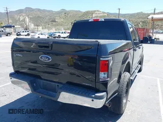 2015 Ford F-150 XL with VIN 1FTEW1CF9FFA30372, listed as a IAAI auction lot 42185034 with 232,099 mi miles and . Bid and sale history available at carsss.com. Image 4.