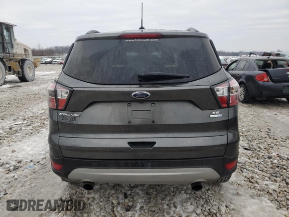 2017 Ford Escape SE with VIN 1FMCU9GD2HUB01278, listed as a Copart auction lot 83115634 with 112,753 mi miles and Clean Title. Bid and sale history available at carsss.com. Image 6.