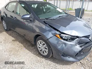 2019 Toyota Corolla L with VIN 2T1BURHE6KC125269, listed as a IAAI auction lot 42082877 with 106,308 mi miles. Bid and sale history available at carsss.com. Image 1.