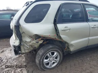 2005 Kia Sportage LX with VIN KNDJF723457135158, listed as a IAAI auction lot 41700735 with 88,200 mi miles and . Bid and sale history available at carsss.com. Image 6.