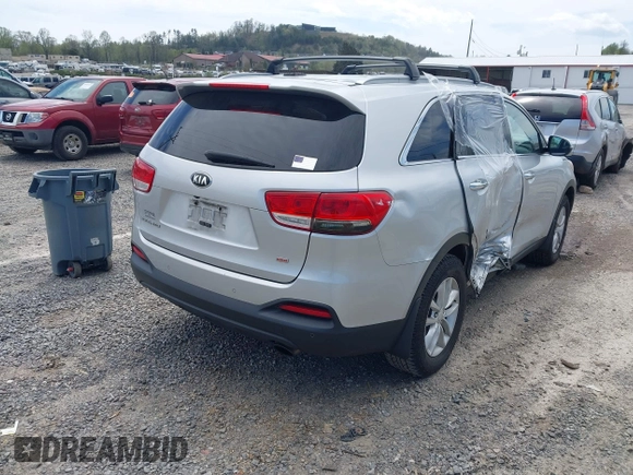 2016 Kia Sorento LX with VIN 5XYPG4A35GG048897, listed as a IAAI auction lot 41986578 with 161,157 mi miles. Bid and sale history available at carsss.com. Image 4.