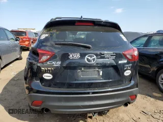 2016 Mazda CX-5 Grand Touring with VIN JM3KE4DY8G0719113, listed as a Copart auction lot 52160285 with 259,365 mi miles and Salvage Title. Bid and sale history available at carsss.com. Image 6.