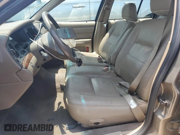 2003 Ford Crown Victoria LX z VIN 2FAFP74W33X141881, wystawiony jako Copart lot #54204695 z przebiegiem 98 466 mil mil oraz Szkoda całkowita • Salvage title. Historia ofert i sprzedaży dostępna na DreamBid. Obrazek 7.