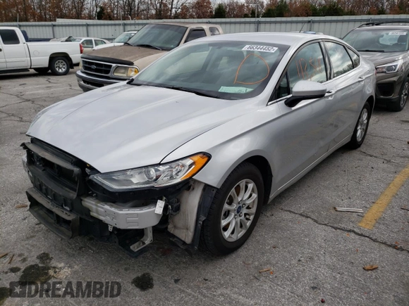 2017 Ford Fusion S with VIN 3FA6P0G77HR273995, listed as a Copart auction lot 82822813 with 113,568 mi miles and Non Repairable. Bid and sale history available at DreamBid. Image 2.