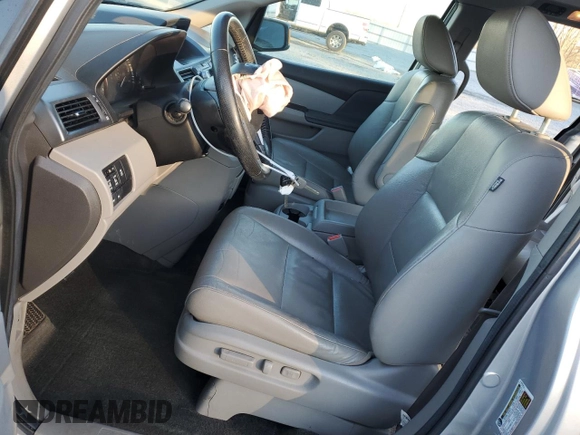 2012 Honda Odyssey Touring with VIN 5FNRL5H9XCB027758, listed as a Copart auction lot 86058504 with 164,860 mi miles and Salvage Title. Bid and sale history available at DreamBid. Image 7.