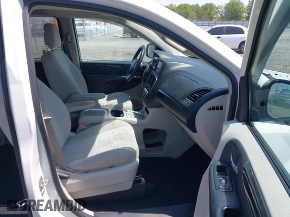 2012 Dodge Grand Caravan SXT with VIN 2C4RDGCG9CR200432, listed as a IAAI auction lot 42027477 with 99,076 mi miles and . Bid and sale history available at DreamBid. Image 5.