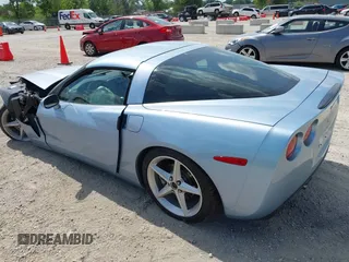 2012 Chevrolet Corvette 1LT with VIN 1G1YE2DW5C5102943, listed as a IAAI auction lot 42629221 with 66,979 mi miles and . Bid and sale history available at DreamBid. Image 3.