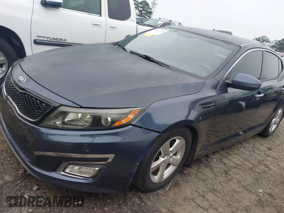 2015 Kia Optima LX with VIN 5XXGM4A70FG486256, listed as a IAAI auction lot 42211318 with 141,515 mi miles and . Bid and sale history available at DreamBid. Image 2.