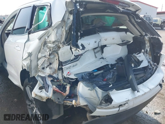 2019 Volvo XC60 Momentum with VIN LYV102DK0KB219297, listed as a IAAI auction lot 41781458 with 80,524 mi miles and . Bid and sale history available at DreamBid. Image 6.