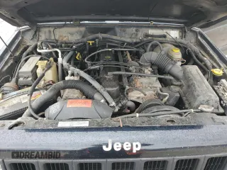 1998 Jeep Cherokee Sport z VIN 1J4FJ68S8WL183519, wystawiony jako Copart lot #60976335 z przebiegiem 161 536 mil mil oraz Czysty tytuł • Clean title. Historia ofert i sprzedaży dostępna na DreamBid. Obrazek 12.