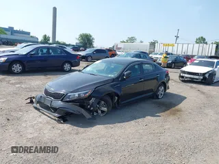 2015 Kia Optima LX with VIN KNAGM4A7XF5653580, listed as a IAAI auction lot 42483072 with 103,589 mi miles and . Bid and sale history available at DreamBid. Image 2.