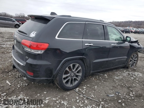 2018 Jeep Grand Cherokee Overland z VIN 1C4RJFCT7JC435403, wystawiony jako Copart lot #86568024 z przebiegiem 105 681 mil mil oraz Szkoda całkowita • Salvage title. Historia ofert i sprzedaży dostępna na DreamBid. Obrazek 3.