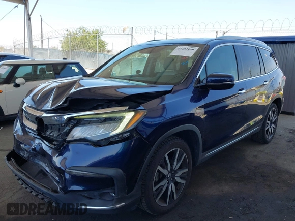 2019 Honda Pilot Touring 8-Passenger z VIN 5FNYF5H97KB013530, wystawiony jako IAAI lot #42403449 z przebiegiem 90 557 mil mil oraz . Historia ofert i sprzedaży dostępna na DreamBid. Obrazek 17.