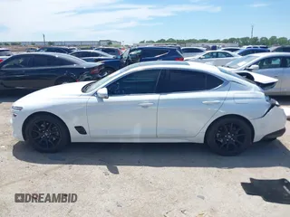 2022 Genesis G70 2.0T with VIN KMTG34TA5NU103935, listed as a IAAI auction lot 42325277 with 30,142 mi miles and . Bid and sale history available at DreamBid. Image 14.