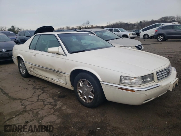 1999 Cadillac Eldorado z VIN 1G6EL12Y5XU600699, wystawiony jako Copart lot #88164505 z przebiegiem 140 075 mil mil oraz Szkoda całkowita • Salvage title. Historia ofert i sprzedaży dostępna na DreamBid. Obrazek 4.
