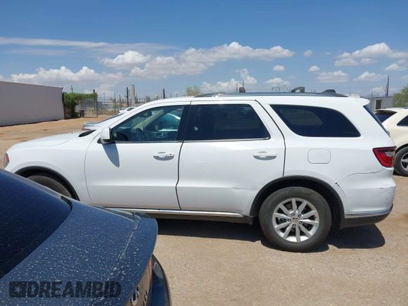 2014 Dodge Durango SXT with VIN 1C4RDHAG7EC561193, listed as a IAAI auction lot 42665946 with 179,977 mi miles and . Bid and sale history available at DreamBid. Image 14.